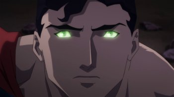 Movie still from “Batman: Hush” (2019), directed by Justin Copeland – A man's face with glowing green eyes; Close Up shot, Over the shoulder angle