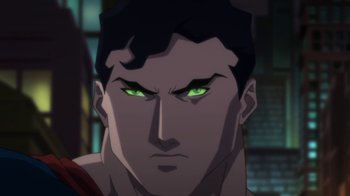 Movie still from “Batman: Hush” (2019), directed by Justin Copeland – A man's face with green eyes; Close Up shot, Low angle