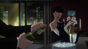 Movie still from “Batman: Hush” (2019), directed by Justin Copeland – A woman holding a bottle of champagne in front of a black cat; Medium shot, Over the shoulder angle