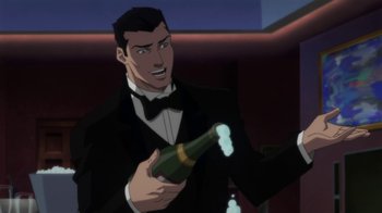 Movie still from “Batman: Hush” (2019), directed by Justin Copeland – A man in a tuxedo is holding a champagne bottle; Medium shot, High angle