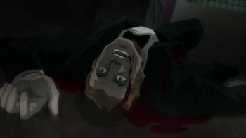 Movie still from “Batman: Hush” (2019), directed by Justin Copeland – A man is laying on the ground with blood all over his face; Close Up shot, High angle
