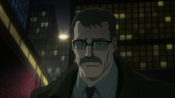 Movie still from “Batman: Hush” (2019), directed by Justin Copeland – A man with a mustache wearing glasses and a jacket; Close Up shot, Low angle