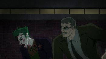 Movie still from “Batman: Hush” (2019), directed by Justin Copeland – A man and a woman are sitting next to each other; Medium shot, Over the shoulder angle