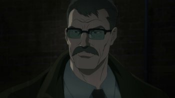 Movie still from “Batman: Hush” (2019), directed by Justin Copeland – An older man with a mustache wearing glasses and a jacket; Close Up shot, Low angle