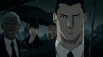 Movie still from “Batman: Hush” (2019), directed by Justin Copeland – A man in a suit and tie holding an umbrella; Close Up shot, Over the shoulder angle