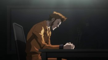 Movie still from “Batman: Hush” (2019), directed by Justin Copeland – A man sitting at a table writing on a piece of paper; Medium shot, Over the shoulder angle