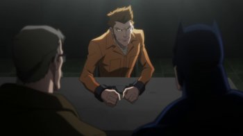 Movie still from “Batman: Hush” (2019), directed by Justin Copeland – A group of people sitting around a table; Medium shot, Over the shoulder angle