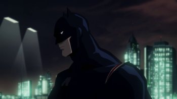 Movie still from “Batman: Hush” (2019), directed by Justin Copeland – A man in a batman suit standing in front of a city; Medium shot, Low angle