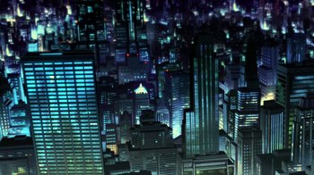 Movie still from “Batman: The Killing Joke” (2016), directed by Sam Liu – An aerial view of a large city at night time; Extreme Wide shot, High angle