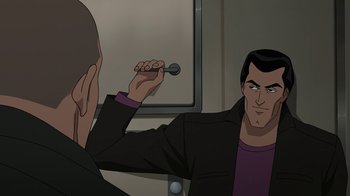 Movie still from “Batman: The Killing Joke” (2016), directed by Sam Liu – A man holding a wrench in front of another man in a mirror; Medium shot, Over the shoulder angle