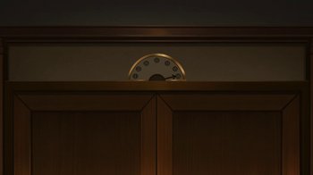 Movie still from “Batman: The Killing Joke” (2016), directed by Sam Liu – A clock is shown on the wall of a room; Extreme Close Up shot, Low angle