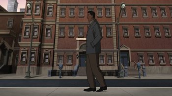 Movie still from “Batman: The Killing Joke” (2016), directed by Sam Liu – An animation of a man walking down the street; Wide shot, Low angle