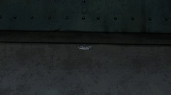 Movie still from “Batman: The Killing Joke” (2016), directed by Sam Liu – A clock on a wall; Extreme Close Up shot, High angle