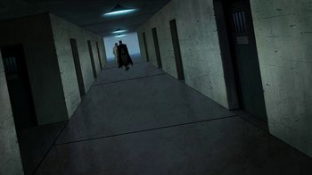 Movie still from “Batman: The Killing Joke” (2016), directed by Sam Liu – A couple of people walking down a hallway in a building; Extreme Wide shot, High angle