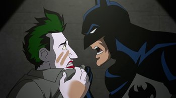 Movie still from “Batman: The Killing Joke” (2016), directed by Sam Liu – A cartoon of a batman and joker face to face; Close Up shot, Over the shoulder angle