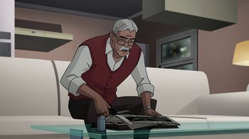 Movie still from “Batman: The Killing Joke” (2016), directed by Sam Liu – An old man sitting on a couch and looking at newspapers; Medium shot, High angle
