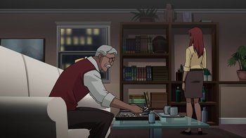 Movie still from “Batman: The Killing Joke” (2016), directed by Sam Liu – An old man sitting in front of a computer in a living room; Wide shot, High angle