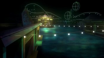 Movie still from “Batman: The Killing Joke” (2016), directed by Sam Liu – An amusement park at night lit up with lights; Extreme Wide shot, High angle