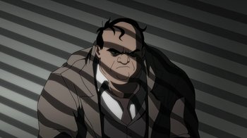 Movie still from “Batman: The Killing Joke” (2016), directed by Sam Liu – An illustration of a man in a black and white striped background; Medium shot, Low angle
