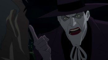 Movie still from “Batman: The Killing Joke” (2016), directed by Sam Liu – A person with an evil look on their face; Close Up shot, Over the shoulder angle