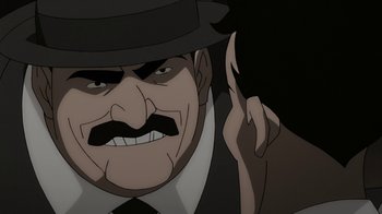 Movie still from “Batman: The Killing Joke” (2016), directed by Sam Liu – An animated picture of a man with a mustache; Close Up shot, Over the shoulder angle