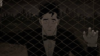 Movie still from “Batman: The Killing Joke” (2016), directed by Sam Liu – A man in a suit and bow tie behind a fence; Close Up shot, High angle
