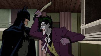 Movie still from “Batman: The Killing Joke” (2016), directed by Sam Liu – The joker and batman are fighting in a room; Medium shot, Over the shoulder angle