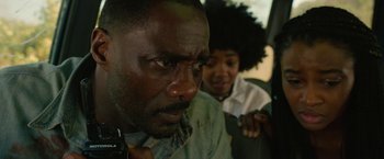 Movie still from “Beast” (2022), directed by Baltasar Kormákur – A man and a woman looking at each other; Close Up shot, Over the shoulder angle