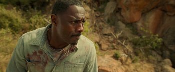 Movie still from “Beast” (2022), directed by Baltasar Kormákur – Idris elba in a scene from the movie beasts of no nation; Close Up shot, High angle