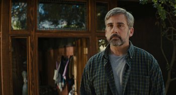 Movie still from “Beautiful Boy” (2018), directed by Felix van Groeningen – A person standing in a room near a window; Medium shot, Over the shoulder angle