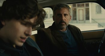 Movie still from “Beautiful Boy” (2018), directed by Felix van Groeningen – A man sitting in the back seat of a car; Close Up shot, Over the shoulder angle