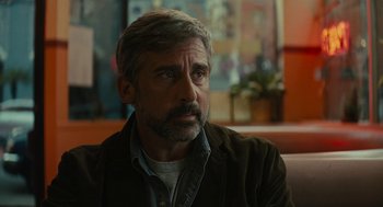 Movie still from “Beautiful Boy” (2018), directed by Felix van Groeningen – A person sitting in a room; Close Up shot, Over the shoulder angle