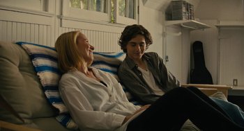 Movie still from “Beautiful Boy” (2018), directed by Felix van Groeningen – A woman and a man sitting next to each other on a couch; Medium shot, Over the shoulder angle