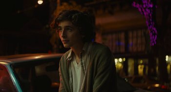Movie still from “Beautiful Boy” (2018), directed by Felix van Groeningen – A young man sitting in a car in the dark; Close Up shot, Over the shoulder angle