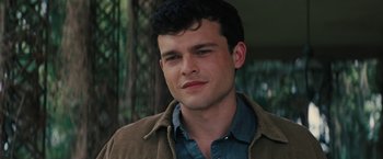 Movie still from “Beautiful Creatures” (2013), directed by Richard LaGravenese – A person wearing a shirt and jacket; Close Up shot, Over the shoulder angle