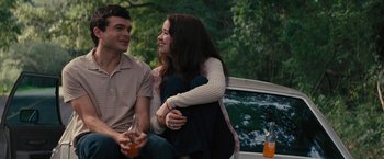 Movie still from “Beautiful Creatures” (2013), directed by Richard LaGravenese – A man and a woman sitting next to each other; Medium shot, Over the shoulder angle