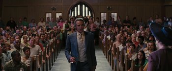 Movie still from “Beautiful Creatures” (2013), directed by Richard LaGravenese – A man walking down the aisle of a church; Wide shot, Low angle