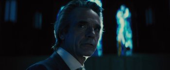 Movie still from “Beautiful Creatures” (2013), directed by Richard LaGravenese – A person wearing a suit and tie; Close Up shot, Low angle