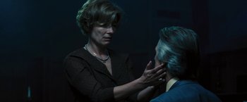 Movie still from “Beautiful Creatures” (2013), directed by Richard LaGravenese – A woman in a dark room touching a man's face; Close Up shot, Over the shoulder angle