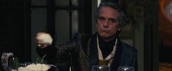 Movie still from “Beautiful Creatures” (2013), directed by Richard LaGravenese – A person sitting at a table; Close Up shot, Over the shoulder angle
