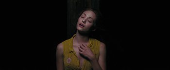 Movie still from “Beautiful Creatures” (2013), directed by Richard LaGravenese – A beautiful young lady with her eyes closed; Close Up shot, High angle
