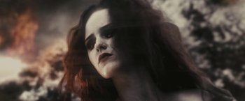 Movie still from “Beautiful Creatures” (2013), directed by Richard LaGravenese – A person with long red hair; Extreme Close Up shot, Low angle