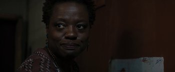 Movie still from “Beautiful Creatures” (2013), directed by Richard LaGravenese – A woman's face in a dark room; Close Up shot, Over the shoulder angle