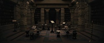 Movie still from “Beautiful Creatures” (2013), directed by Richard LaGravenese – A room filled with lots of tables and chairs and books; Extreme Wide shot, High angle