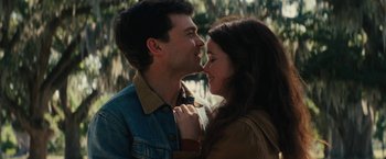 Movie still from “Beautiful Creatures” (2013), directed by Richard LaGravenese – A man and a woman are looking into each others eyes; Close Up shot, Low angle