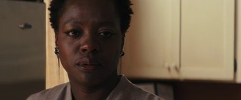 Movie still from “Beautiful Creatures” (2013), directed by Richard LaGravenese – A person wearing ear buds; Close Up shot, Over the shoulder angle