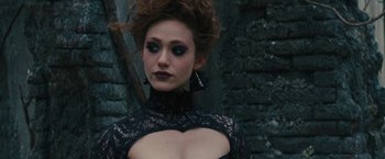 Movie still from “Beautiful Creatures” (2013), directed by Richard LaGravenese – A woman in a black dress and a black lace top; Close Up shot, Over the shoulder angle