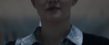A blurry picture of a person's face