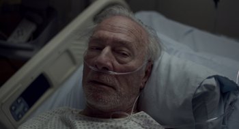 Movie still from “Beginners” (2010), directed by Mike Mills – An older man laying in a hospital bed; Close Up shot, High angle