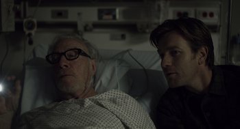 Movie still from “Beginners” (2010), directed by Mike Mills – A man and a woman in a hospital bed; Close Up shot, Over the shoulder angle